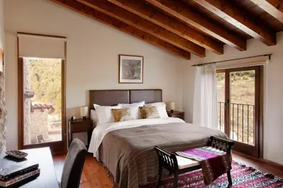 Cama o camas de una habitación en Hotel Mas de la Serra