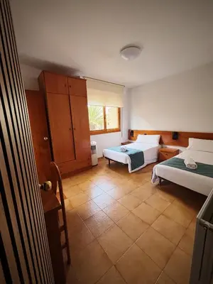 Cama o camas de una habitación en Hostal Legaz
