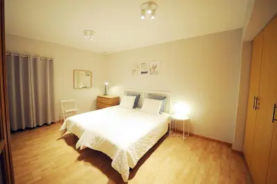Cama o camas de una habitación en DONES Apartamento en el Casco Histórico de Zaragoza