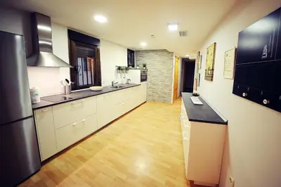 Una cocina o zona de cocina en DONES Apartamento en el Casco Histórico de Zaragoza