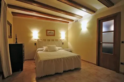 Cama o camas de una habitación en Apartamentos Santa Agueda