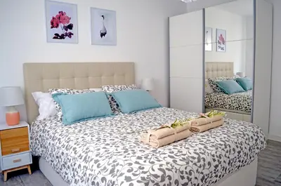 Cama o camas de una habitación en Apartamento PILARE, a las puertas del Pirineo Navarro