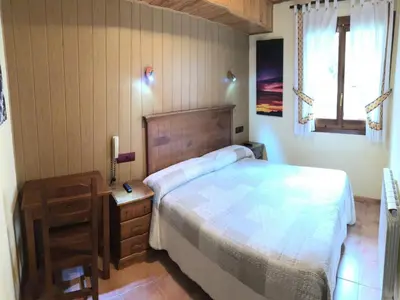 Cama o camas de una habitación en Hotel Sarao 3000