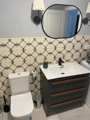 Un baño de Apartahotel Belchite