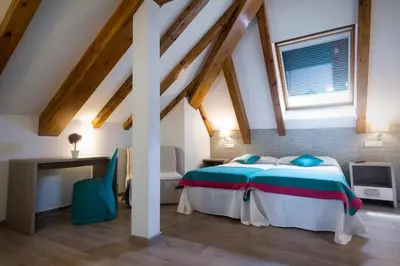 Cama o camas de una habitación en Hotel Rural Auñamendi