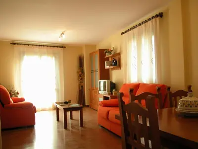 Una televisión o centro de entretenimiento en Apartamentos Estop