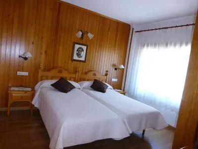 Cama o camas de una habitación en Hotel Bellavista Ordesa