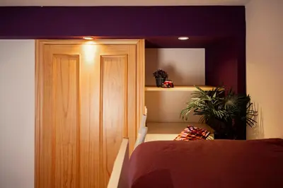 Cama o camas de una habitación en Inmocyma Antigua Casa Chuanina, bajo-Benasque