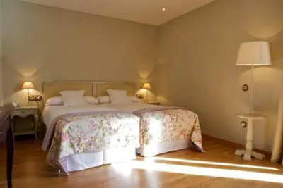 Cama o camas de una habitación en Hotel Villa Monter