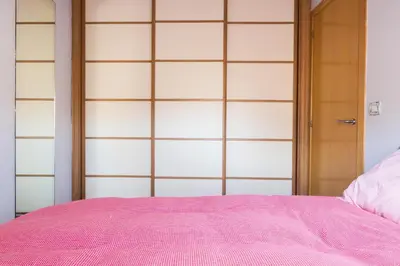 Cama o camas de una habitación en FANTASTICA BUHARDILLA PZ. PILAR