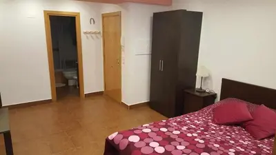 Cama o camas de una habitación en Apartamenticos Boggiero I