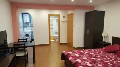 Cama o camas de una habitación en Apartamenticos Boggiero I