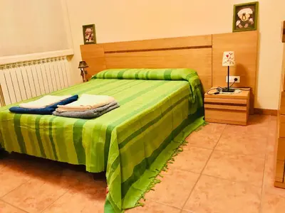 Cama o camas de una habitación en Puerta de Sobrarbe - Torreciudad