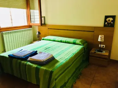 Cama o camas de una habitación en Puerta de Sobrarbe - Torreciudad