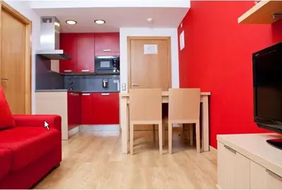 Una cocina o zona de cocina en Apartahotel Castejón de Sos