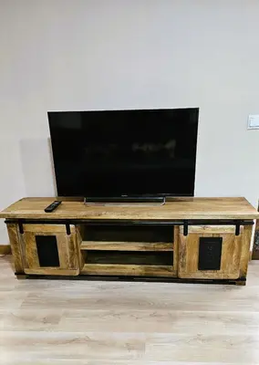 Una televisión o centro de entretenimiento en Ca l'Aixut Turismo Rural