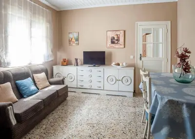 Una televisión o centro de entretenimiento en Casa Rural Marila