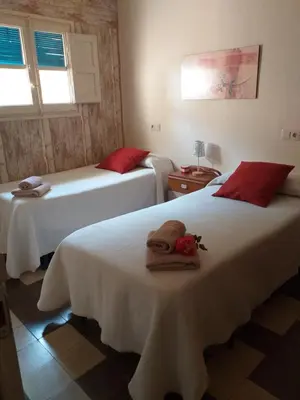 Cama o camas de una habitación en Casa Rural Marila