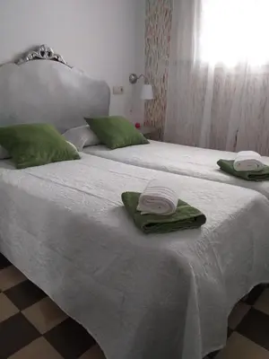 Cama o camas de una habitación en Casa Rural Marila