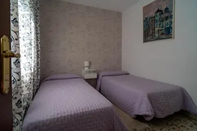 Cama o camas de una habitación en El Campo