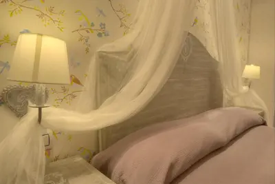 Cama o camas de una habitación en Apartamentos Rurales El Rapallo