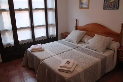 Cama o camas de una habitación en DELICIAS