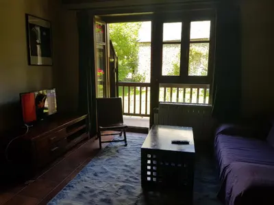 Una televisión o centro de entretenimiento en Apartamento salardu