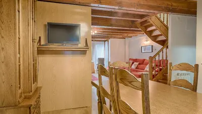 Una televisión o centro de entretenimiento en Saplan Real Estate MONTLUDE