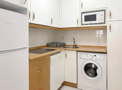 Una cocina o zona de cocina en Gestión de Alojamientos Apartments