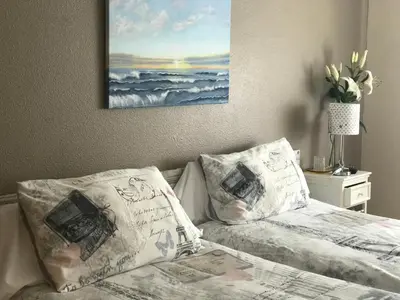 Cama o camas de una habitación en Alojamientos Iruña