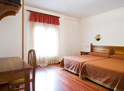 Cama o camas de una habitación en Hotel Latre