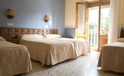 Cama o camas de una habitación en Hotel Latre
