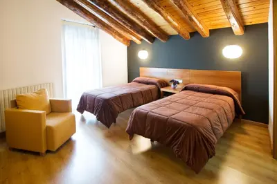 Cama o camas de una habitación en Allotjament Rural Cal Miquel