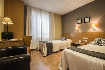 Cama o camas de una habitación en Hotel Casa Jacinto Pamplona
