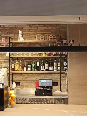 El salón o zona de bar de Hotel Villa de Zaragoza