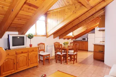 Una cocina o zona de cocina en Apartamentos Albá Casa Alquesera
