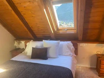 Cama o camas de una habitación en Hostal Escuils
