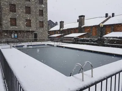 Atico duplex Urb La Viña en Biescas en invierno