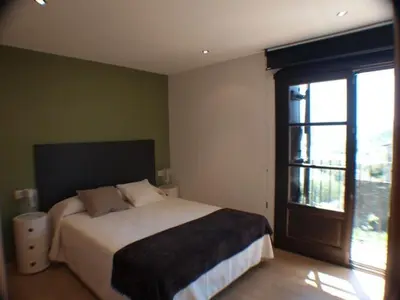 Cama o camas de una habitación en El Mirador de Ainsa