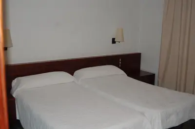 Cama o camas de una habitación en Hotel Betriu