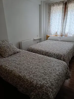 Cama o camas de una habitación en PASEO DE LOS AYERBE Nº5