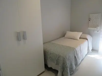 Cama o camas de una habitación en Alcañiz Flats I