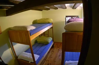 Cama o camas de una habitación en Albergue Restaurante de Artieda