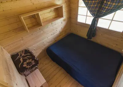 Cama o camas de una habitación en Albergue Restaurante de Artieda