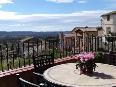 Un balcón o terraza de Apartamentos Casa Sanz