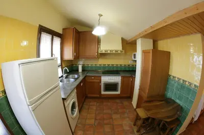 Una cocina o zona de cocina en Apartamentos Casa Sanz