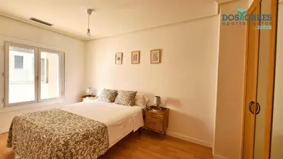 Cama o camas de una habitación en Dos Torres Boromir - en el Corazón de la Ciudad