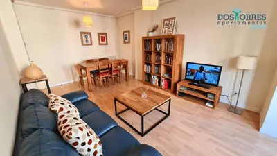 Una televisión o centro de entretenimiento en Dos Torres Boromir - en el Corazón de la Ciudad