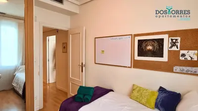 Cama o camas de una habitación en Dos Torres Boromir - en el Corazón de la Ciudad