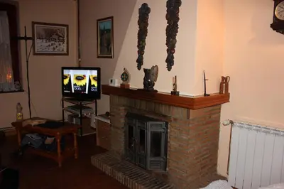 Una televisión o centro de entretenimiento en Casa Aranesa